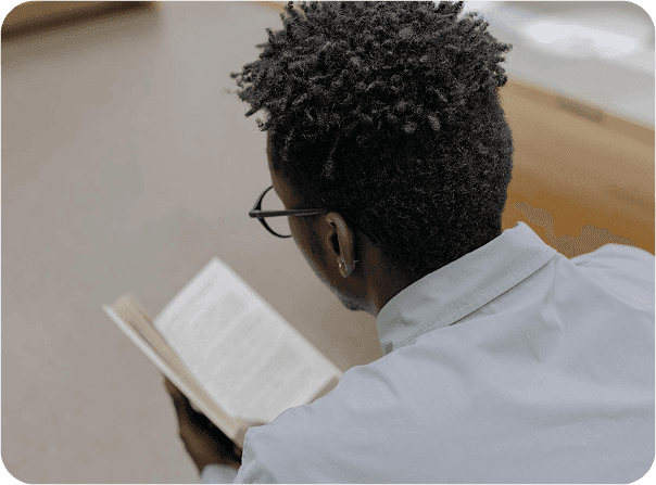 young man reading a book